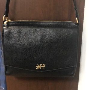 Freshly picked crossbody diaper bag.